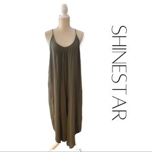 Shinestar olive green romper with adjustable straps. Size S
